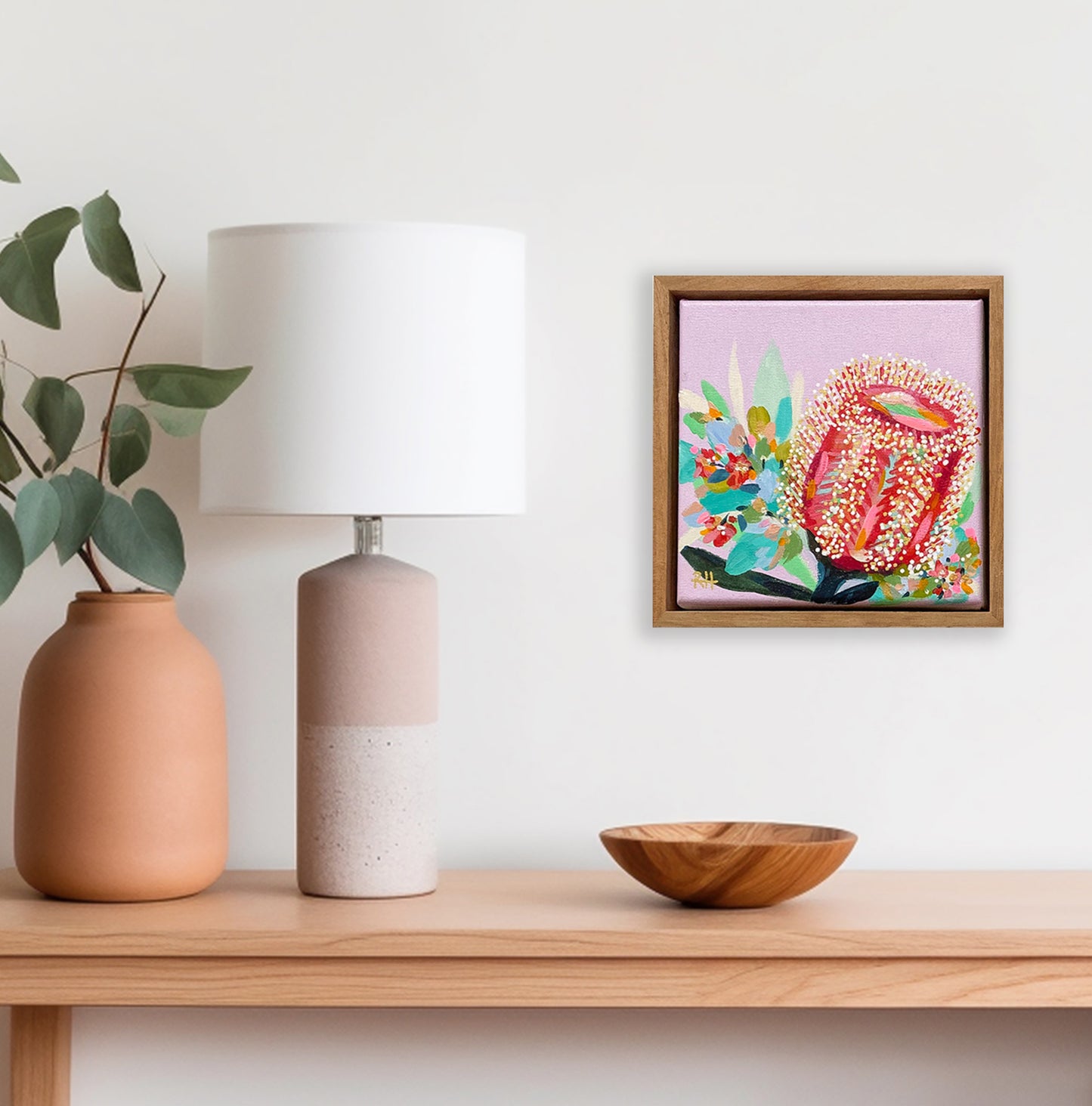 Soft & Spiky – framed 20x20cm mini original artwork by Rachelle Holowko featuring a colourful banksia bloom on blush pink.