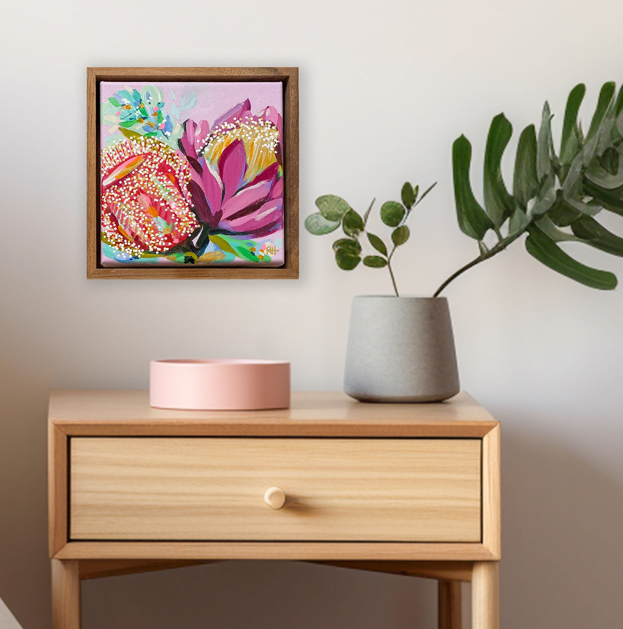 Sugar Bloom – vibrant mini floral painting by Rachelle Holowko with a pink banksia and purple protea, framed and ready to hang.


