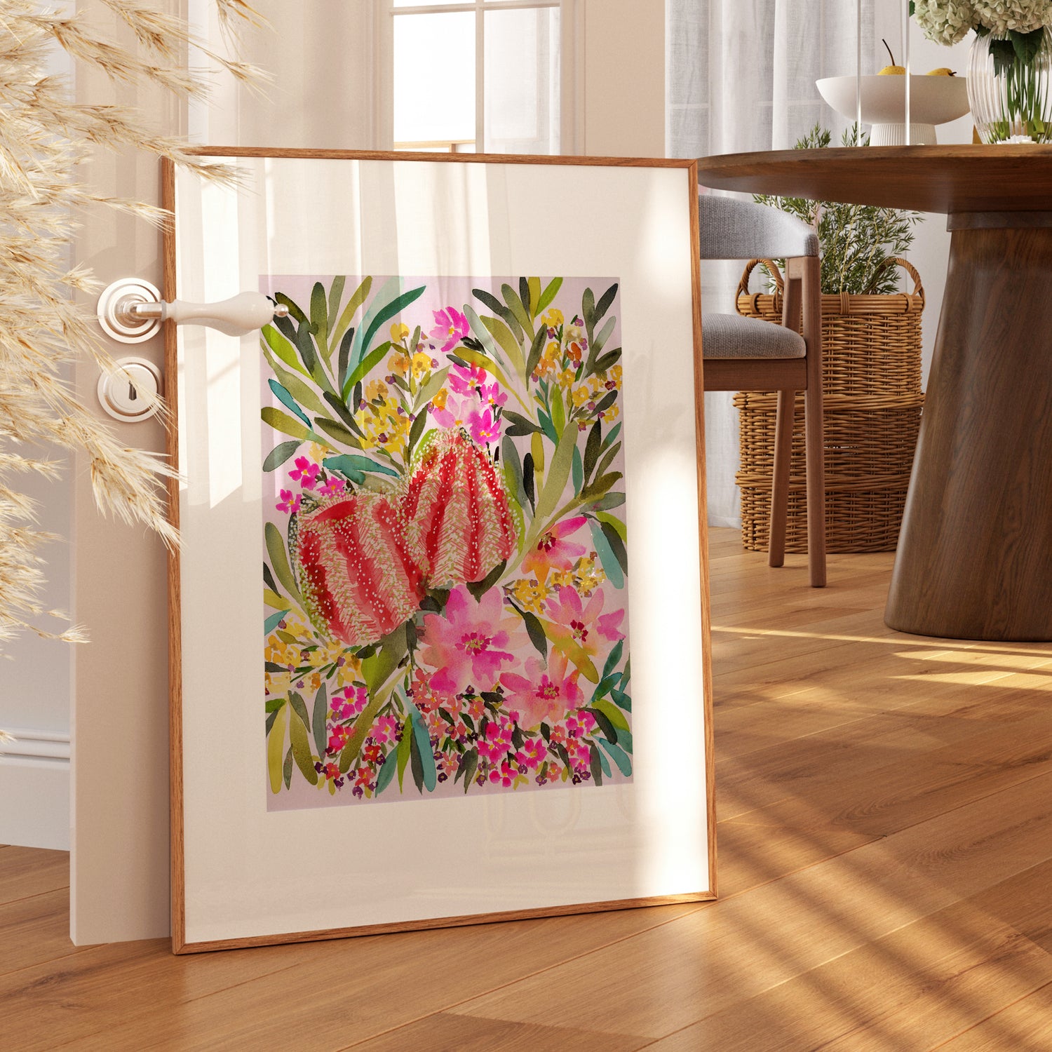 Watercolour print “Tropical Banksia” by Rachelle Holowko – vibrant banksia flower artwork in lush greens and peaches styled in a modern home